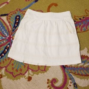 Cream mini skirt with texture detail